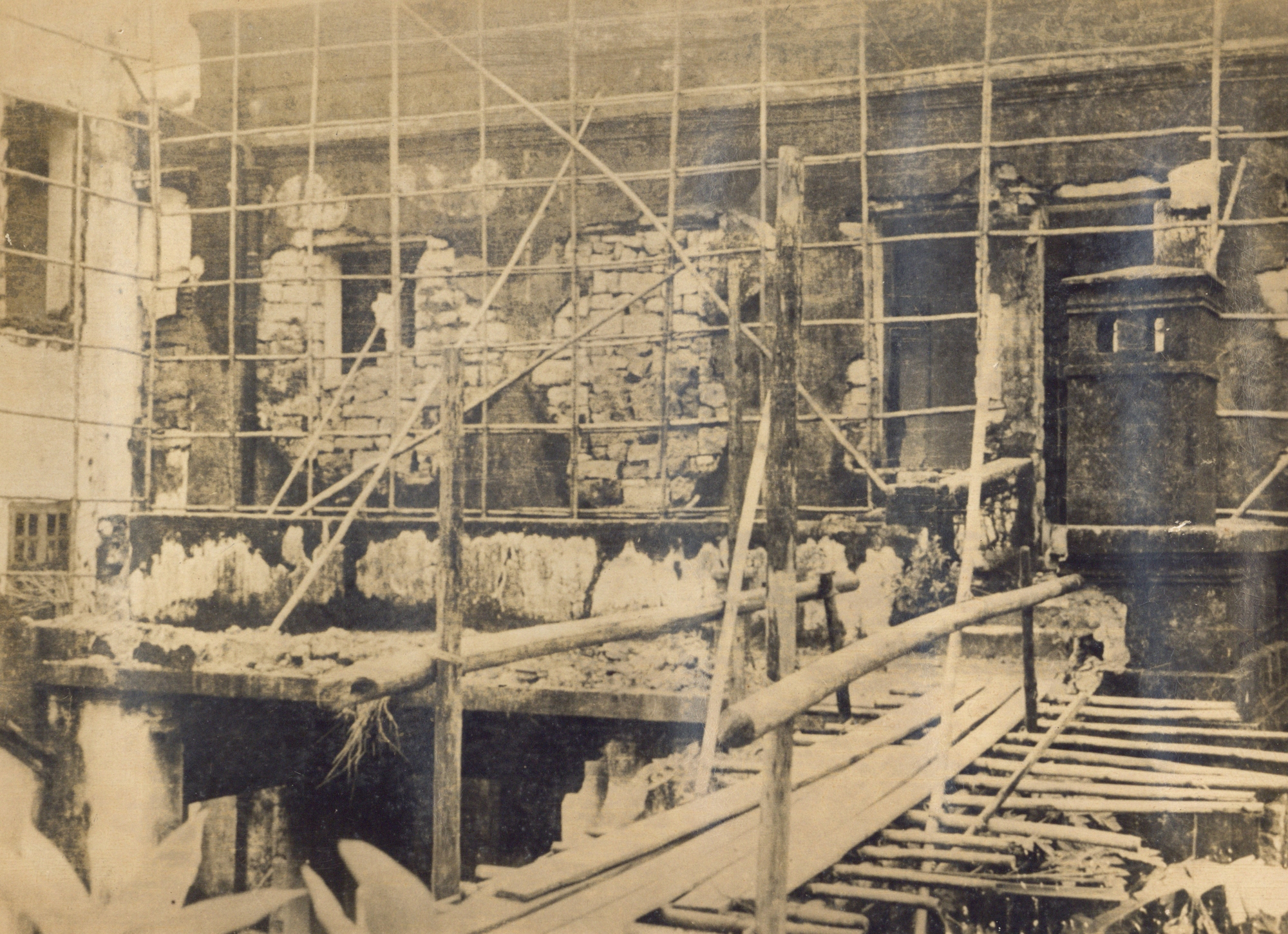Back of the main building under repair after the War
