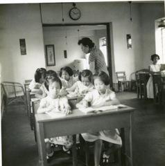 Girls of the Orphanage attending class