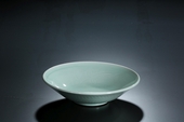 Misty-blue porcelain plate with skip-cut pattern